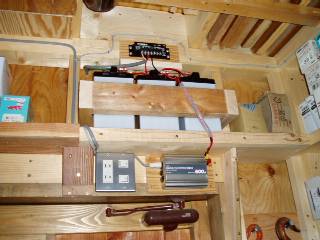 charge controller, batteries, inverter, and switch