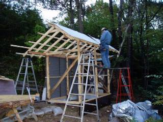 roof with galvarium steel sheets and wall with used "amado" (sliding shutters)