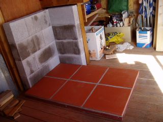 put the base in place and lay concrete blocks as walls