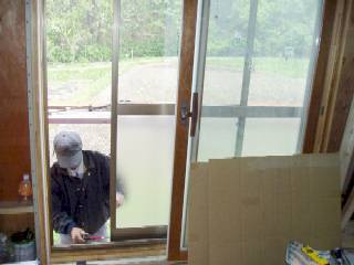 installing used aluminum sash outside of used wooden window with paired glass (temporarily placed here)