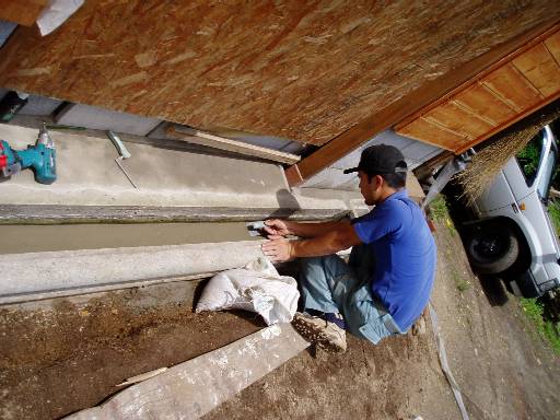 use concrete poles from scrapped winery as walls of the ditch